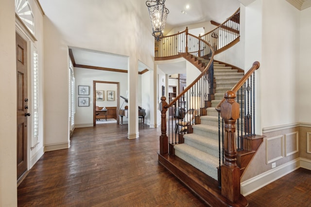 1041 Bandelier Dr, Allen, TX 75013 - entrance foyer featuring dark wood-style floors, stairway, a high ceiling, and a chandelier