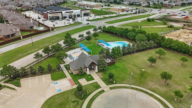 birds eye view of property with a residential view