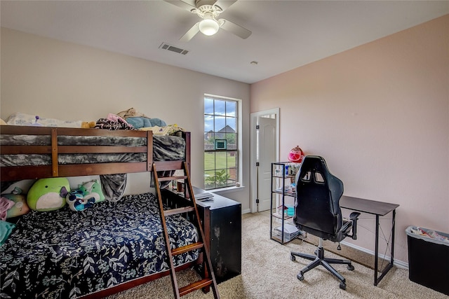 bedroom featuring visible vents, carpet flooring, baseboards, and a ceiling fan