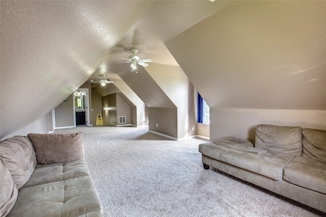 11041 Helms Trl, Forney, TX 75126 - living room featuring a ceiling fan, carpet flooring, a textured ceiling, and visible vents
