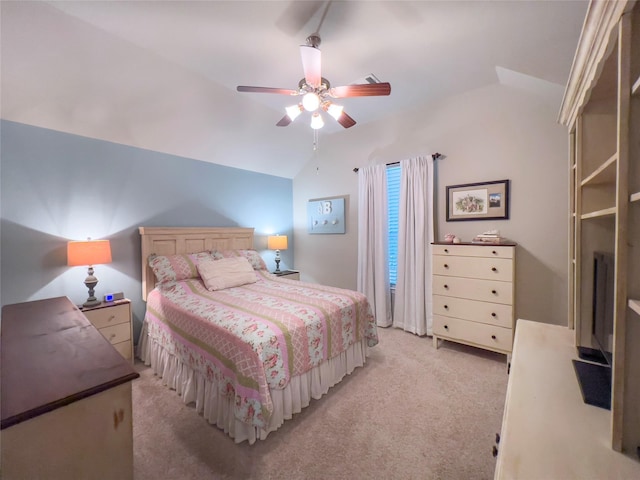 bedroom with ceiling fan, light carpet, and lofted ceiling