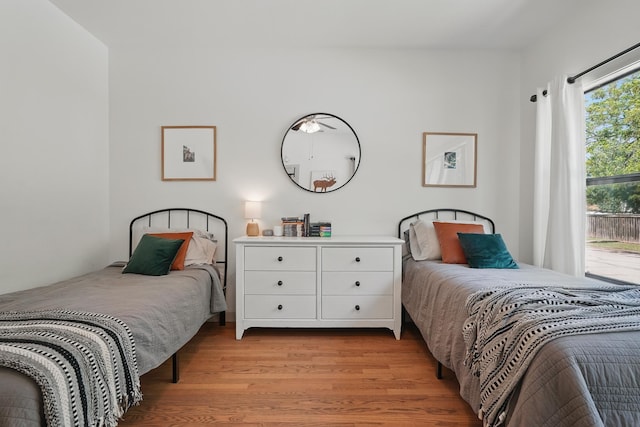1202 Grand Ave, Abilene, TX 79605 - bedroom with light wood-type flooring and access to exterior