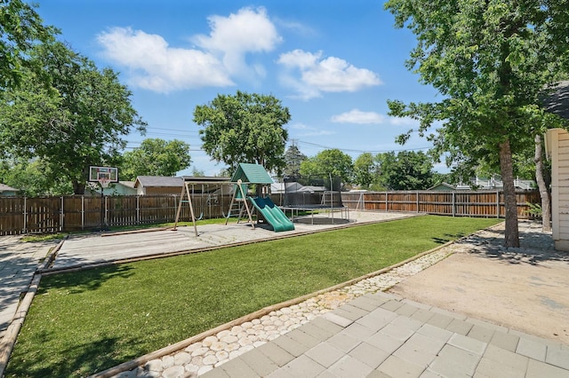 1202 Grand Ave, Abilene, TX 79605 - view of playground with a trampoline and a patio area