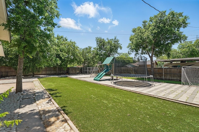 1202 Grand Ave, Abilene, TX 79605 - view of jungle gym with a trampoline