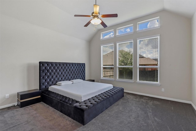 carpeted bedroom with a ceiling fan, baseboards, and vaulted ceiling