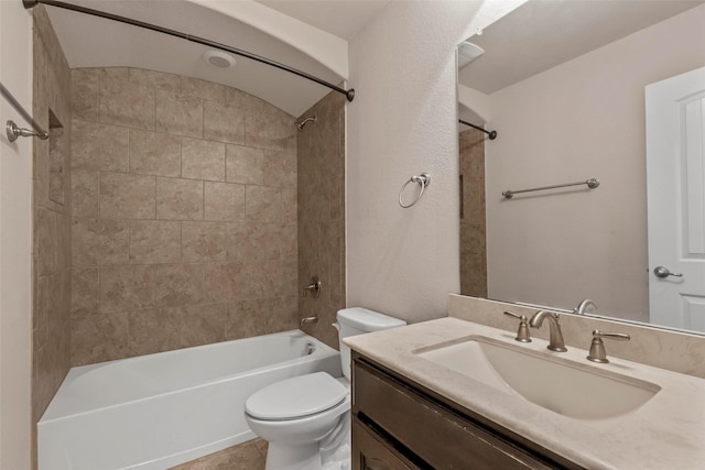bathroom with vanity, bathtub / shower combination, and toilet