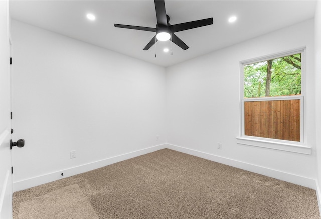 carpeted empty room with baseboards, ceiling fan, and recessed lighting
