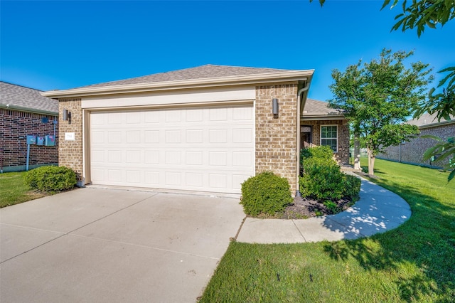 7793 Gulf Walk Rd, Frisco, TX 75036 - view of front facade with brick siding, driveway, a front lawn, and a garage