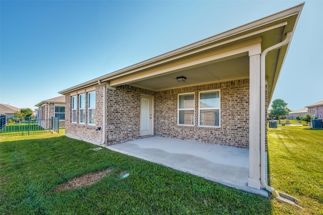 7793 Gulf Walk Rd, Frisco, TX 75036 - rear view of house with brick siding, a patio, and central air condition unit