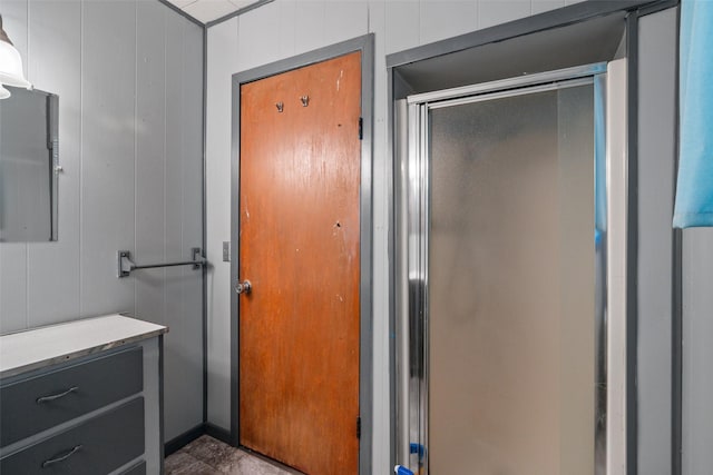 bathroom featuring a shower stall