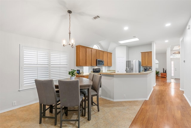 2505 Canyon Bay, Mckinney, TX 75072 - dining space featuring vaulted ceiling, a chandelier, baseboards, recessed lighting, and plenty of natural light