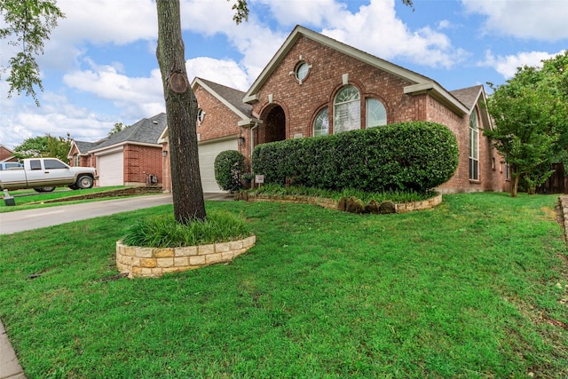 2505 Canyon Bay, Mckinney, TX 75072 - view of front of house with brick siding, an attached garage, and a front lawn