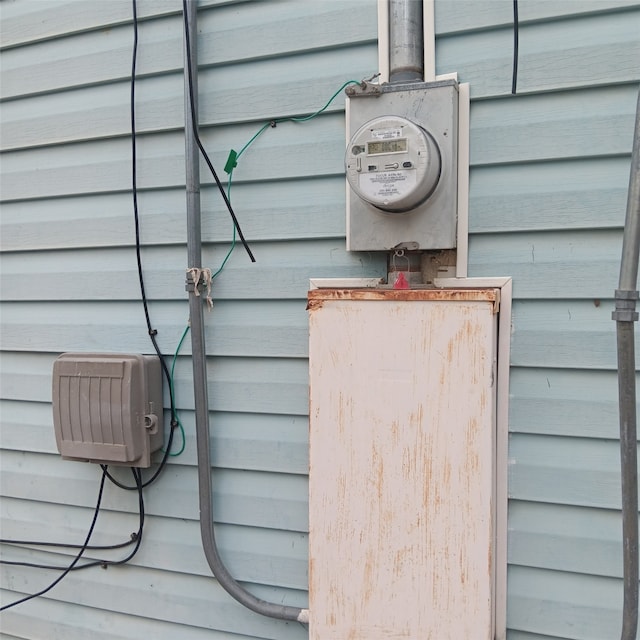 exterior details featuring electric meter