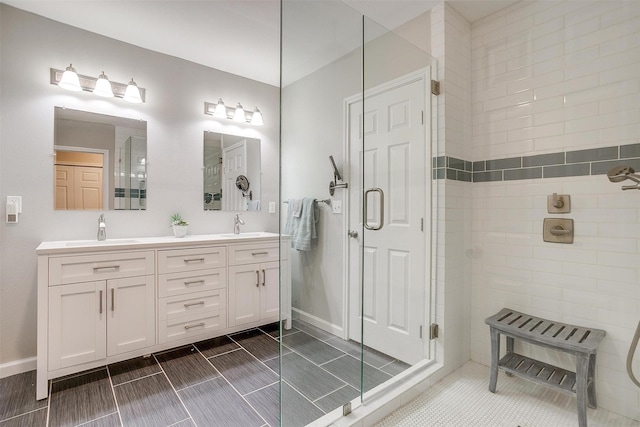 3707 Knob Hill Rd, Azle, TX 76020 - bathroom with a stall shower, double vanity, and baseboards