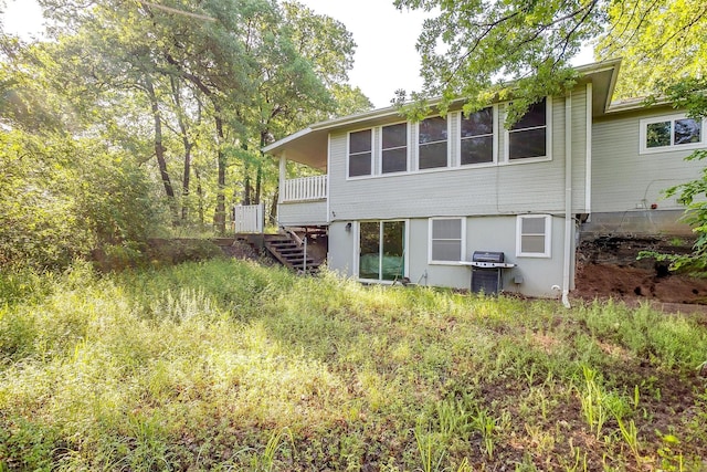 3707 Knob Hill Rd, Azle, TX 76020 - rear view of house featuring stairway and a deck