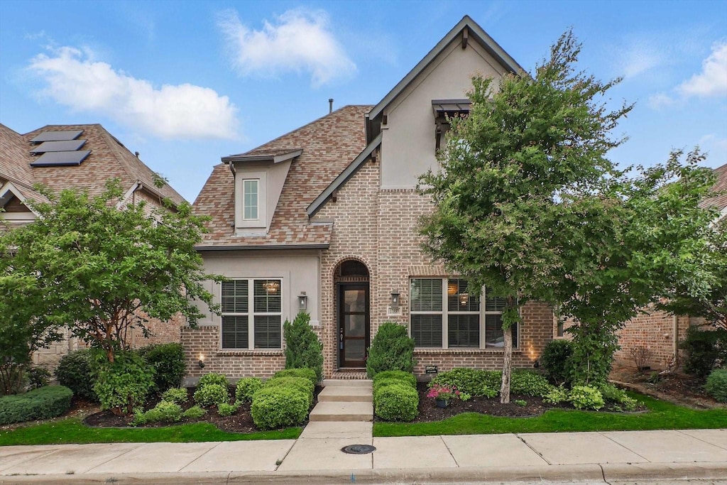 17557 Sequoia Dr, Dallas, TX 75252 - english style home featuring stucco siding and brick siding