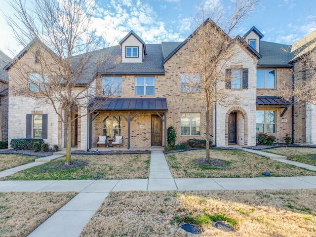 6285 Davison Way, Mckinney, TX 75070 - view of property with brick siding and a front lawn