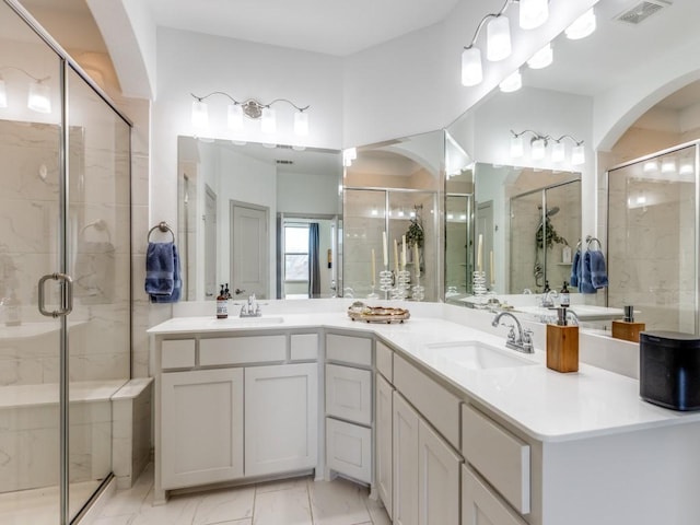 6285 Davison Way, Mckinney, TX 75070 - full bath with visible vents, a sink, marble finish floor, and a shower stall