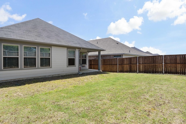 view of yard featuring a fenced backyard