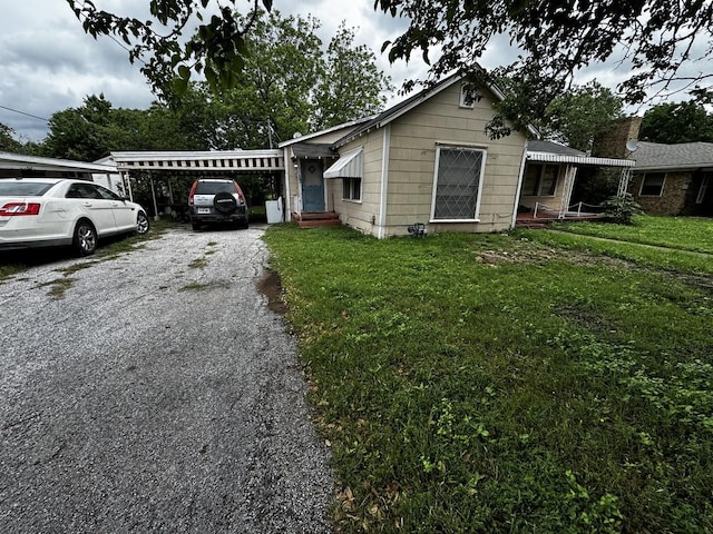 322 Hill St, Grand Prairie, TX 75050 - exterior space featuring a lawn and driveway