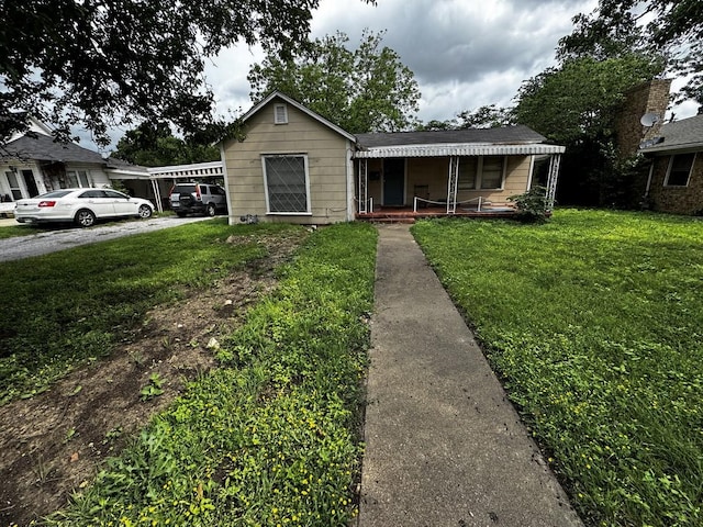 322 Hill St, Grand Prairie, TX 75050 - view of front of property featuring a porch and a front yard