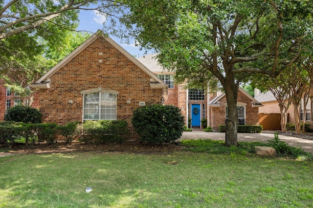 3301 Gillespie Rd, Mckinney, TX 75072 - traditional-style home featuring a front yard and brick siding
