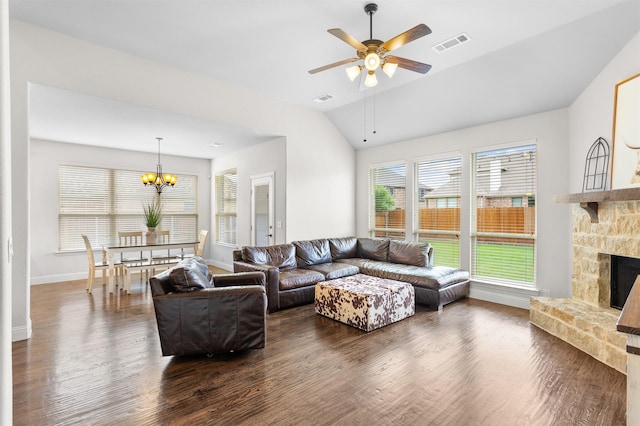 1005 Middleton St, Forney, TX 75126 - living room featuring dark wood-style floors, a chandelier, vaulted ceiling, baseboards, and a fireplace