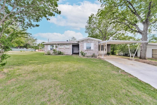 single story home featuring an attached carport, driveway, a front lawn, and brick siding
