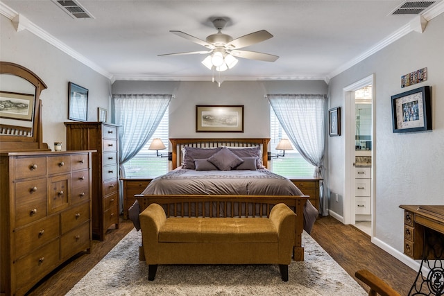 1621 Lake Hill Ln, Plano, TX 75023 - bedroom featuring crown molding, dark wood-type flooring, baseboards, a ceiling fan, and connected bathroom