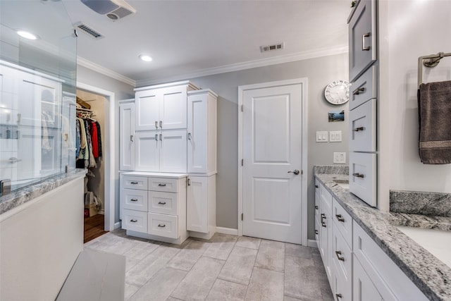 1621 Lake Hill Ln, Plano, TX 75023 - bathroom featuring a shower stall, crown molding, vanity, recessed lighting, and baseboards