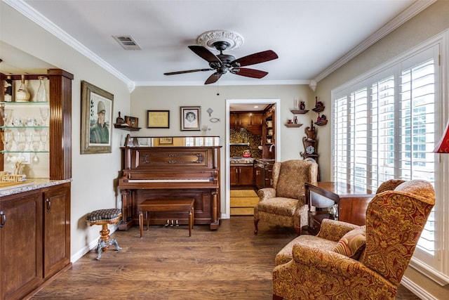 1621 Lake Hill Ln, Plano, TX 75023 - living area featuring crown molding, dark wood-type flooring, and a ceiling fan