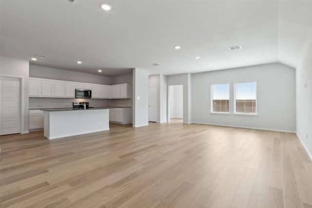 1946 Callington Way, Forney, TX 75126 - unfurnished living room with visible vents, recessed lighting, light wood-style floors, and baseboards