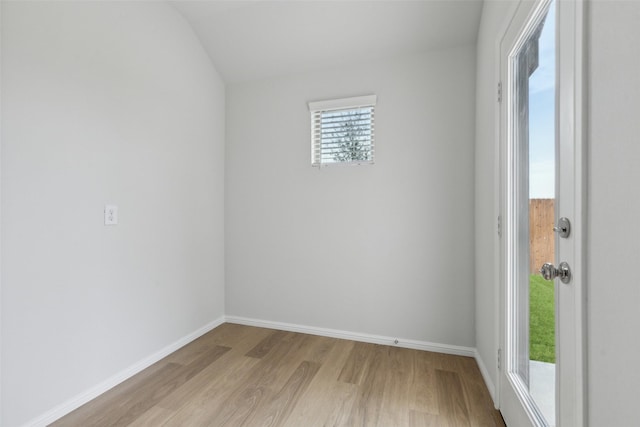 1946 Callington Way, Forney, TX 75126 - spare room featuring baseboards, lofted ceiling, and light wood finished floors