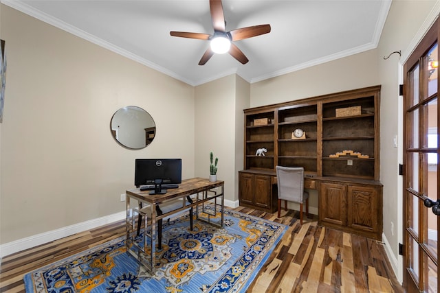 office area with baseboards, a ceiling fan, light wood finished floors, and ornamental molding