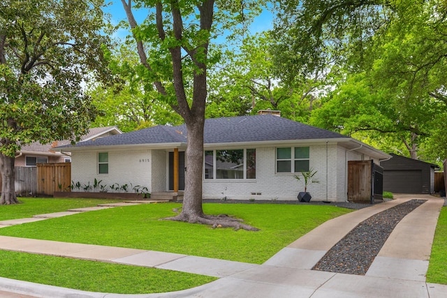 single story home with fence, roof with shingles, a front lawn, brick siding, and a chimney