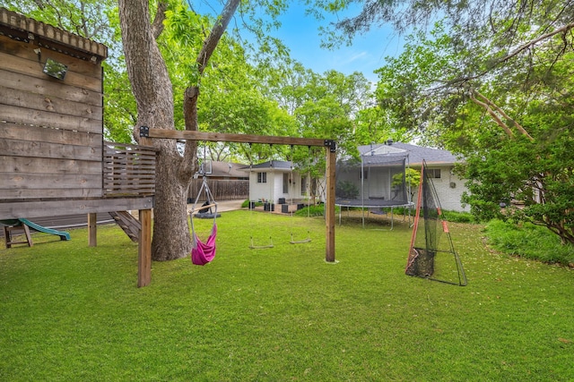 view of yard featuring a trampoline