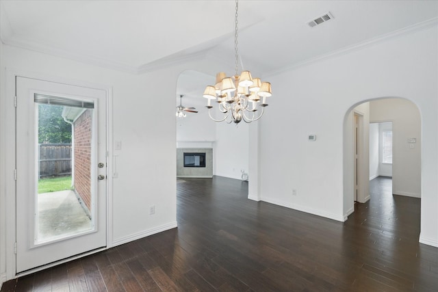 unfurnished dining area with an inviting chandelier, arched walkways, plenty of natural light, and visible vents