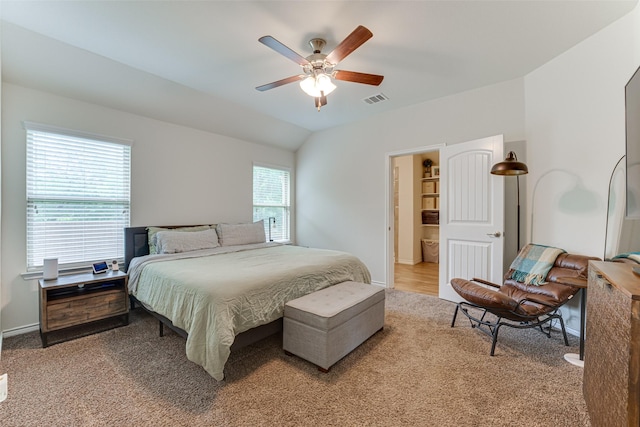 bedroom featuring carpet floors, a ceiling fan, baseboards, and visible vents