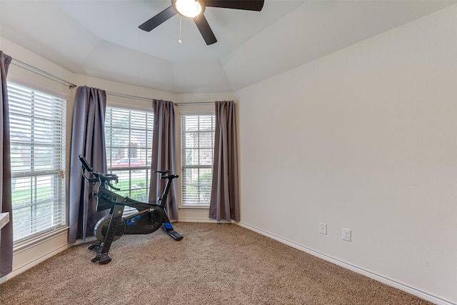 workout room with vaulted ceiling, baseboards, carpet, and a ceiling fan