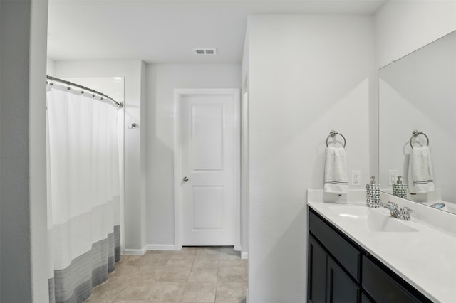 3613 Ridgeway Ln, Denton, TX 76226 - full bath featuring vanity, baseboards, a shower with curtain, and tile patterned floors
