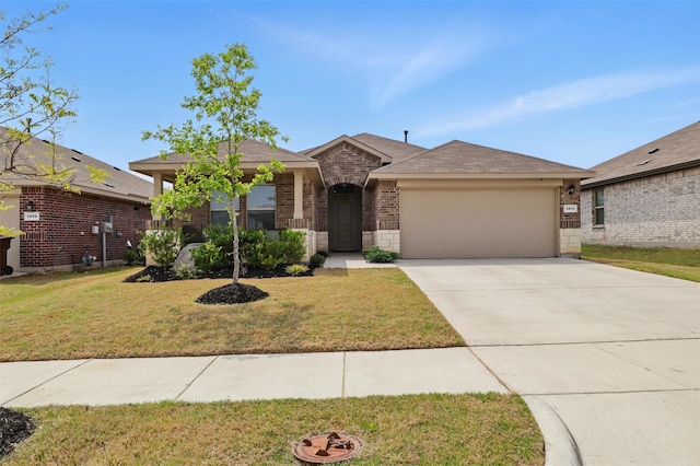 3613 Ridgeway Ln, Denton, TX 76226 - ranch-style home featuring brick siding, an attached garage, a front lawn, and driveway