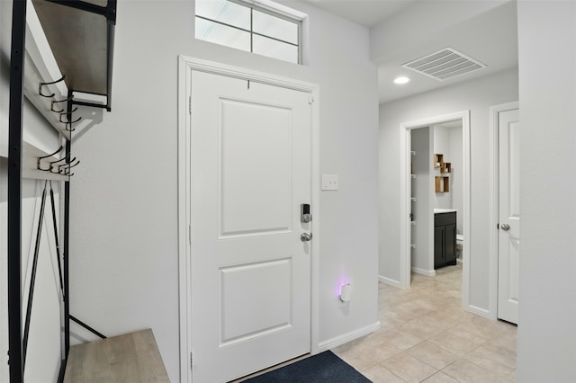 3613 Ridgeway Ln, Denton, TX 76226 - foyer featuring light tile patterned floors and baseboards