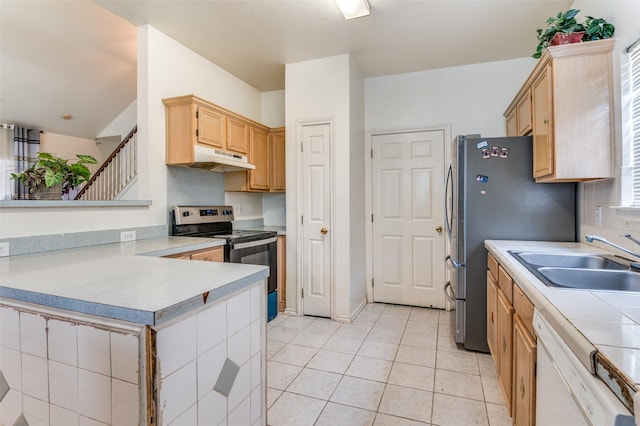 2839 Meadow Way Ln, Dallas, TX 75228 - kitchen featuring light countertops, light tile patterned floors, a sink, under cabinet range hood, and stainless steel appliances
