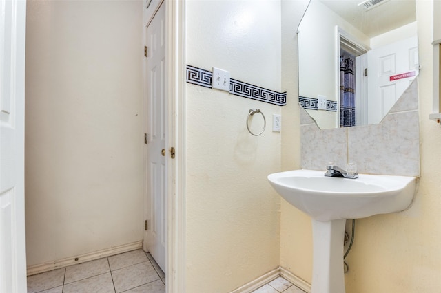 2839 Meadow Way Ln, Dallas, TX 75228 - bathroom with tile patterned floors and baseboards