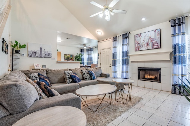 2839 Meadow Way Ln, Dallas, TX 75228 - living area with ceiling fan, high vaulted ceiling, a tiled fireplace, light tile patterned floors, and visible vents