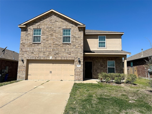 traditional-style home with a front yard, brick siding, fence, concrete driveway, and an attached garage