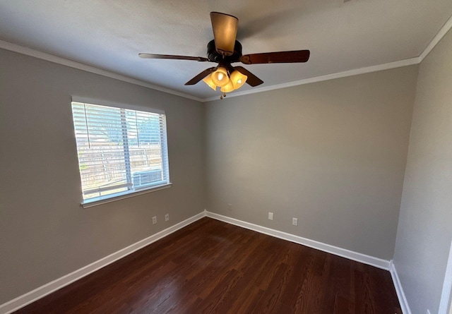 unfurnished room with a ceiling fan, baseboards, dark wood finished floors, and ornamental molding