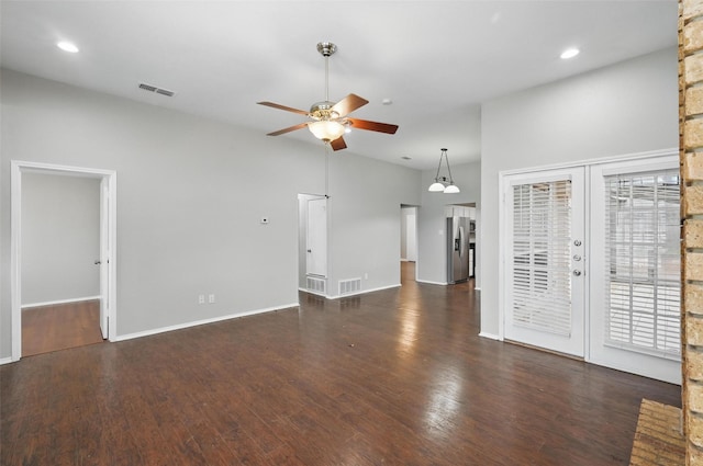 6317 N Park Dr, Watauga, TX 76148 - unfurnished living room with visible vents, a ceiling fan, wood finished floors, and french doors