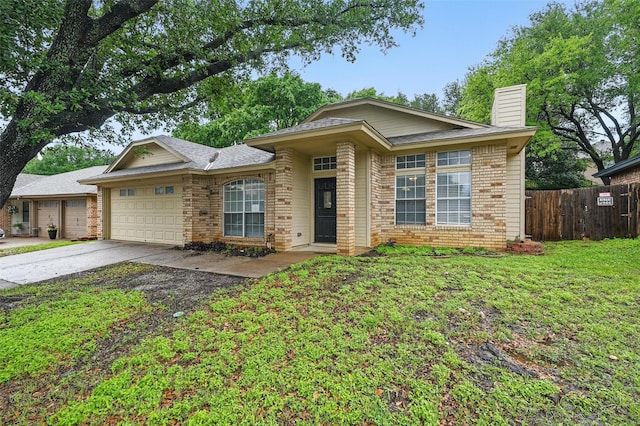 6317 N Park Dr, Watauga, TX 76148 - single story home featuring a chimney, a garage, fence, a front lawn, and concrete driveway