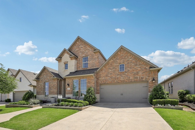 traditional-style house featuring concrete driveway, brick siding, a shingled roof, and a front yard